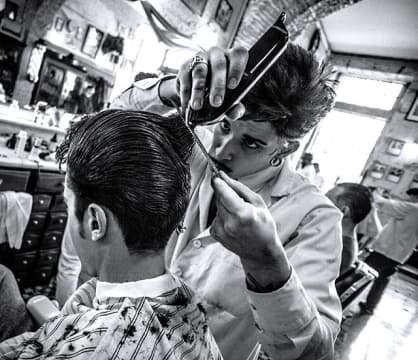 Barber makes haircut